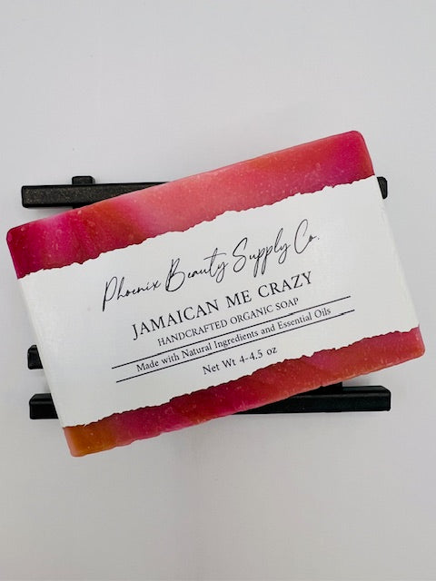 Jamaican Me Crazy handcrafted organic soap with a creamy lather, leaving skin radiant and nourished with a tropical fragrance. Perfect for everyday use.