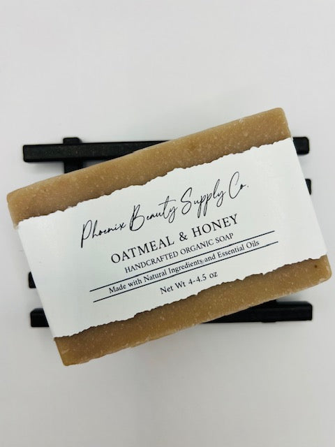 Oatmeal & Honey handmade organic bar soap with a luxurious creamy lather, perfect for hydrating and exfoliating skin naturally.